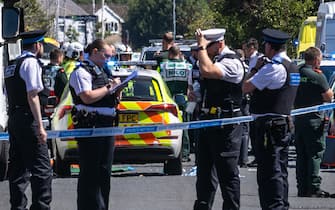 Police in Southport, Merseyside, where a man has been detained and a knife has been seized after a number of people were injured in a reported stabbing. Eight patients with stab injuries have been treated at the scene and taken to hospitals including Alder Hey Children's Hospital. Picture date: Monday July 29, 2024. (Photo by James Speakman/PA Images via Getty Images)