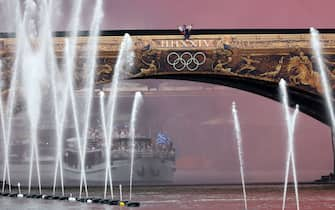 PARIS, FRANCE - JULY 26:  Team Greece begins the athletesâ   parade past water jets and the water curtain under the Austerlitz Bridge on the Seine during the opening ceremony of the Olympic Games Paris 2024 on July 26, 2024 in Paris, France. (Photo by Kevin C. Cox/Getty Images)