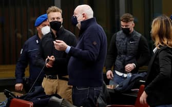 epa09056503 Defendant Finnegan Lee Elder (L) talks with his lawyer Renato Borzone (C) as he arrives with other defendant Gabriel Natale-Hjorth (R) for a hearing in the trial where they are accused of slaying the Carabinieri paramilitary police officer Mario Cerciello Rega, in Rome, Italy, 06 March 2021. US Gabriel Natale-Hjorth  and Finnegan Lee Elder are accused of slaying the Carabinieri paramilitary police officer, Mario Cerciello Rega, while on vacation in Italy in July 2019.  EPA/ALESSANDRA TARANTINO / POOL