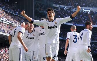 MADRID, SPAIN - MARCH 02:  Alvaro Morata (C) of Real Madrid CF celebrates with his team-mates after Karim Benzema (L) of Real Madrid CF (L) scored the opening goal during the La Liga match between Real Madrid CF and FC Barcelona at Bernabeu on March 2, 2013 in Madrid, Spain.  (Photo by David Ramos/Getty Images)