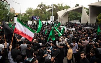Mandatory Credit: Photo by Sobhan Farajvan/Pacific Press/Shutterstock (14496235k)
Iranian people attend a mourners rally for President Ebrahim Raisi in front of the entrance of Tehran University, Tehran, Iran, on Tuesday, May 21, 2024. President Raisi and the country's foreign minister, Hossein Amirabdollahian, were found dead Monday hours after their helicopter crashed in fog.
Mourners rally for the President Ebrahim Raisi, Tehran, Iran - 21 May 2024