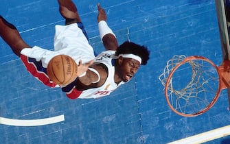 AUBURN HILLS, MI - JUNE 15:  Ben Wallace #3 of the Detroit Pistons grabs a rebound during Game Five of the 2004 NBA Finals on June 15, 2004 at The Palace of Auburn Hills in Auburn Hills, Michigan. NOTE TO USER: User expressly acknowledges and agrees that, by downloading and/or using this Photograph, User is consenting to the terms and conditions of the Getty Images License Agreement.  Mandatory Copyright Notice: Copyright 2004 NBAE.  (Photo by Andrew D. Bernstein/NBAE via Getty Images)