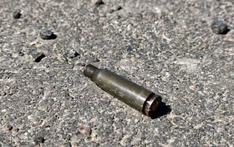 A cartridge lies on the ground in the Chernobyl Exclusion Zone after the withdrawal of Russian troops, Kyiv Region, northern Ukraine, April 28, 2022. Russian forces have vacated the area surrounding Chernobyl, but Ukrainian officials are now sounding the alarm that troops were likely exposed to high amounts of radiation after they intentionally disturbed radioactive dust. Workers at the Chernobyl Nuclear Power Plant (NPP), the site of the 1986 nuclear disaster, have warned for weeks that Russian troops were kicking up clouds of radioactive dust after driving armored vehicles through an area known as the “red forest.” Photo by Hennadii Minchenko/Ukrinform/ABACAPRESS.COM