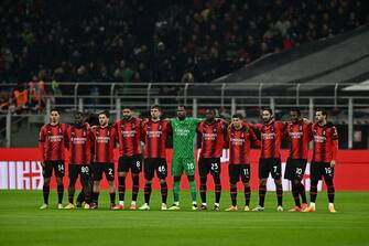 AC Milan's players stand in a line prior to the Italian Serie A football match between AC Milan and Inter Milan at the San Siro Stadium in Milan on April 22, 2024. (Photo by GABRIEL BOUYS / AFP) (Photo by GABRIEL BOUYS/AFP via Getty Images)