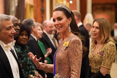 Britain's Catherine, Princess of Wales meets with guests during a reception for members of the Diplomatic Corps at Buckingham Palace, in London, on December 5, 2023. (Photo by Jonathan Brady / POOL / AFP) (Photo by JONATHAN BRADY/POOL/AFP via Getty Images)