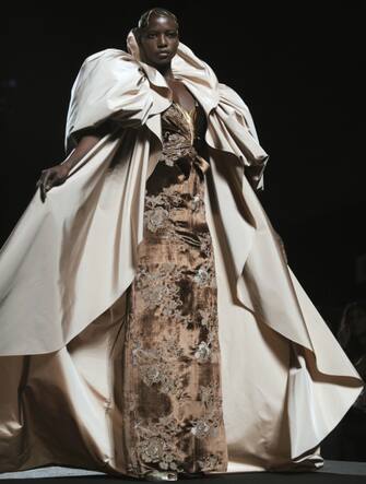 A model presents a creation from Italian fashion designer Lorenzo Riva 's Women Fall/Winter 2008 Haute Couture collection at the Rome Fashion Week in Rome's Santo Spirito in Sassia on July 10, 2008. AFP PHOTO / FILIPPO MONTEFORTE (Photo credit should read FILIPPO MONTEFORTE/AFP via Getty Images)