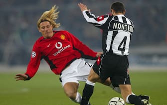 THIS PICTURE CAN ONLY BE USED WITHIN THE CONTEXT OF AN EDITORIAL FEATURE. NO WEBSITE/INTERNET USE UNLESS SITE IS REGISTERED WITH FOOTBALL ASSOCIATION PREMIER LEAGUE UK OUT, NO MAGS,  SALES, ARCHIVES, INTERNET
PAP13 - 20030225 - TURIN, ITALY : Manchester United's Diego Forlan (let) battles with Paolo Montero of Juventus before sustaining an injury, during their Champions League, group D phase 2 match, at the Stadio Delle Alpi in Turin, Tuesday 25th February 2003.
EPA PHOTO PA/MARTIN RICKETT/MR ms
