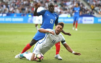PARIS, FRANCE - JUNE 13: N'Golo Kante of France and Alex Oxlade-Chamberlain of England during the international friendly match between France and England at Stade de France on June 13, 2017 in Saint-Denis near Paris, France. (Photo by Jean Catuffe/Getty Images)