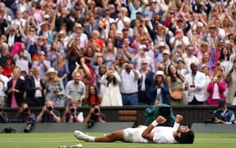 Carlos Alcaraz celebrates victory over Novak Djokovic following the Gentlemen's Singles final on day fourteen of the 2023 Wimbledon Championships at the All England Lawn Tennis and Croquet Club in Wimbledon. Picture date: Sunday July 16, 2023.