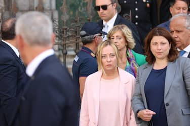 La presidente del Consiglio Giorgia Meloni dopo la visita alla tomba di Giovanni Falcone nella chiesa di  San Domenico a Palermo, 19 luglio 2023.
ANSA/Igor Petyx