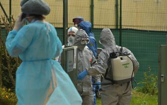 Russian soldiers, along with Italian soldiers, carry out the disinfection of a  retirement home for the elderly in Alzano Lombardo, northern Italy, 28 March 2020. Italy is under lockdown in an attempt to stop the widespread of the SARS-CoV-2 coronavirus causing the Covid-19 disease. 
ANSA/ TIZIANO MANZONI