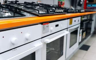 sale of gas cooktops in a home appliance store. built-in hob