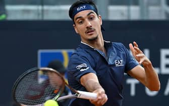 Lorenzo Sonego of Italy in action during his men's singles second round match against Yoshihito Nishioka of Japan (not pictured) at the Italian Open tennis tournament in Rome, Italy, 13 May 2023.  ANSA/ETTORE FERRARI 