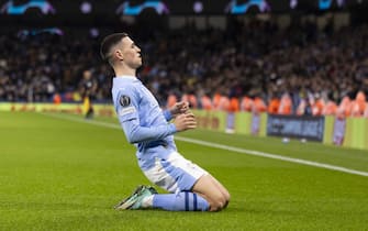 epa10963425 Manchester City's Phil Foden celebrates after scoring his sides second goal during the UEFA Champions League group stage match between Manchester City and BSC Young Boys at the Etihad stadium in Manchester, Britain, 07 November 2023.  EPA/PETER KLAUNZER