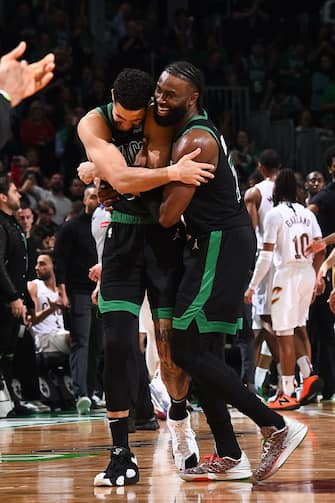 BOSTON, MA - MAY 15: Jayson Tatum #0 embraces Jaylen Brown #7 of the Boston Celtics during the game against the Cleveland Cavaliers during Round 2 Game 5 of the 2024 NBA Playoffs on May 15, 2024 at the TD Garden in Boston, Massachusetts. NOTE TO USER: User expressly acknowledges and agrees that, by downloading and or using this photograph, User is consenting to the terms and conditions of the Getty Images License Agreement. Mandatory Copyright Notice: Copyright 2024 NBAE  (Photo by Brian Babineau/NBAE via Getty Images)