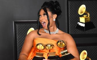 megan thee stallion grammy epa09075432 A handout photo made available by The Recording Academy shows Megan Thee Stallion, winner of the Best Rap Performance and Best Rap Song awards for 'Savage' and the Best New Artist award, posing in the press room during the 63rd Annual Grammy Awards ceremony at the Los Angeles Convention Center, in Los Angeles, California, USA, 14 March 2021. EPA/KEVIN MAZUR / HANDOUT ATTENTION EDITORS: IMAGE TO BE USED ONLY IN RELATION TO THE STATED EVENT / HANDOUT EDITORIAL USE ONLY/NO SALES/NO ARCHIVES
