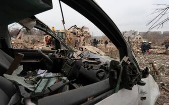 epa11235914 Rescue team and police officers at work at the scene of a missile strike near private buildings in Zaporizhzhia, Ukraine, 22 March 2024, amid the Russian invasion. According to the Air Force Command of the Armed Forces of Ukraine, Russia has launched projectiles against over 151 targets across Ukraine. The Ukrainian army intercepted 92 of them. Several people were killed across the country, with at least one dead and 14 injured in Zaporizhzhia alone, according to the regionâ€™s State Military Administration.  EPA/KATERYNA KLOCHKO