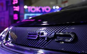 A BYD Co. badge on the front grille of a Dolphin compact electric vehicle on display at the Tokyo Auto Salon in Chiba, Japan, on Friday, Jan. 13, 2023. The annual event at Makuhari Messe convention center runs through Jan. 15. Photographer: Kiyoshi Ota/Bloomberg via Getty Images