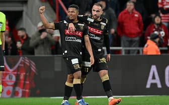 Joel Chima Fujita (8) of STVV celebrates with Fatih Kaya (11) of STVV after scoring the 0-1 goal during the Jupiler Pro League season 2023 - 2024 match day 20 between Standard de Liege and K. St-Truidense VV on December 27 , 2023 in Liege, Belgium. (Photo by David Catry/Isosport/Content Curation/Sipa USA)