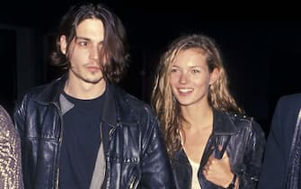 CULVER CITY,CA - FEBRUARY 22:   Actor Johnny Depp and model Kate Moss attend the Richard Tyler's New Fashion Collection and Screening of Johnny Depp's Directorial Debut of Short Film "Banter" to Benefit the Drug Abuse Resistance Education (DARE) on February 22, 1994 at Smashbox Studios in Culver City, California. (photo by Ron Galella, Ltd./Ron Galella Collection via Getty Images)