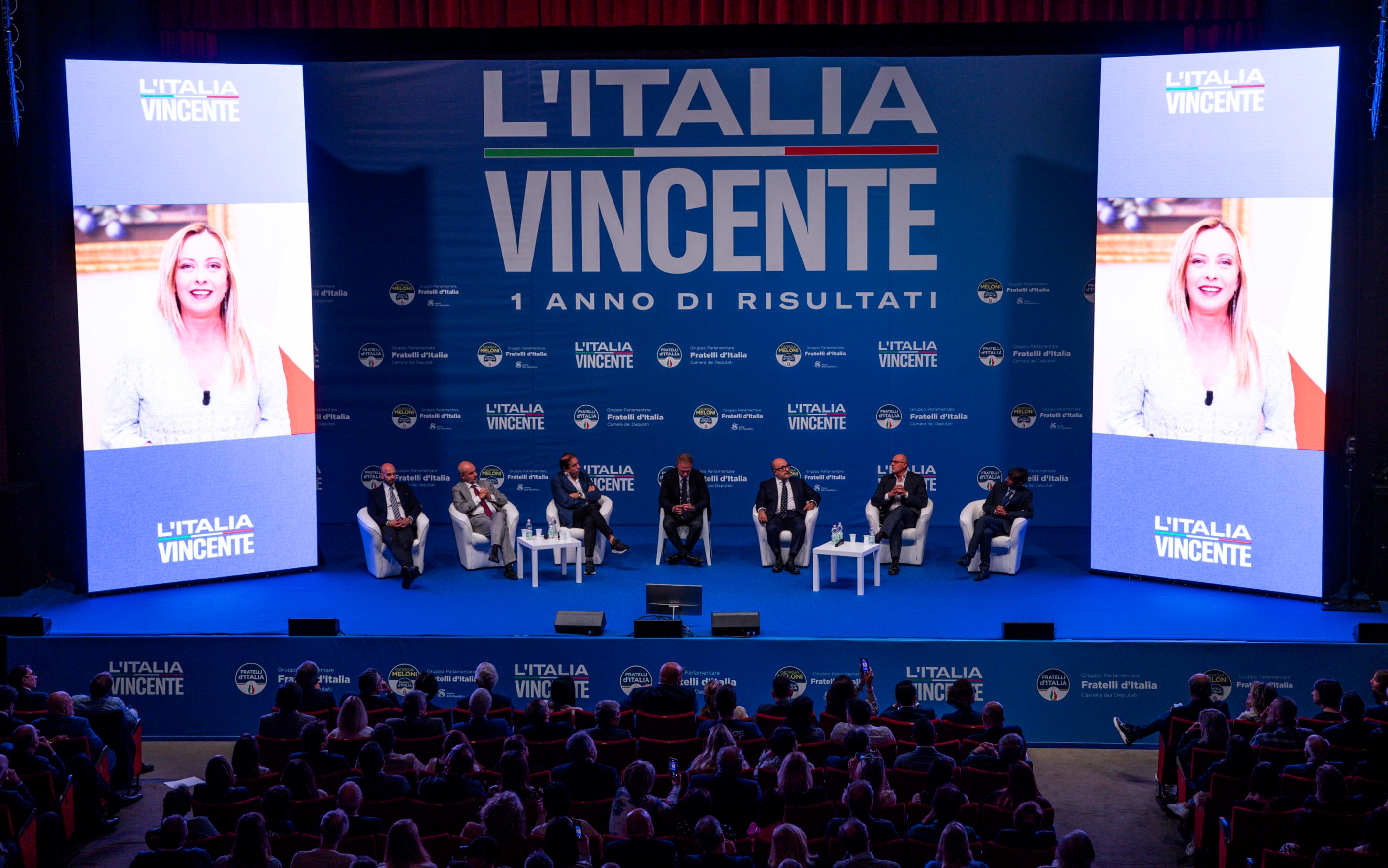 Il presidente del Consiglio Giorgia Meloni in collegamento durante la manifestazione di Fratelli d'Italia "L'Italia vincente. Un anno di risultati. Come il governo Meloni sta facendo ripartire la Nazione" ad un anno dell’elezione di Giorgia Meloni a presidente del Consiglio, presso il Teatro Brancaccio, Roma, 22 ottobre 2023. ANSA/ANGELO CARCONI