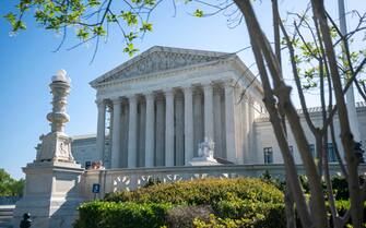 epa10580420 A general exterior view of the Supreme Court, as justices are set to issue an order on whether women will face restrictions in getting mifepristone, the abortion pill, at the Supreme Court in Washington, DC, USA, 19 April  2023. The Biden administration and New York-based drugmaker Danco Laboratories want the Supreme Court to reject limits on mifepristone's use imposed by lower courts.  EPA/SHAWN THEW