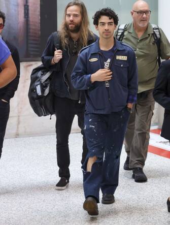 Nick, Joe and Kevin Jonas land in Sydney ahead of their Australian Jonas Brothers Tour. The brothers landed with a huge entourage including Joe's new girlfriend, model Stormi Bree (in yellow jacket)



Pictured: Joe Jonas

Ref: SPL10777349 280224 EXCLUSIVE

Picture by: Media-Mode / SplashNews.com



Splash News and Pictures

USA: 310-525-5808 
UK: 020 8126 1009

eamteam@shutterstock.com



World Rights, No Argentina Rights, No Australia Rights, No Bolivia Rights, No Brazil Rights, No Chile Rights, No Colombia Rights, No Costa Rica Rights, No Cuba Rights, No Dominican Republic Rights, No Ecuador Rights, No El Salvador Rights, No Guadeloupe Rights, No Guatemala Rights, No Mexico Rights, No Nicaragua Rights, No New Zealand Rights, No Paraguay Rights, No Peru Rights, No Panama Rights, No Portugal Rights, No Puerto Rico Rights, No Spain Rights, No Uruguay Rights, No Venezuela Rights