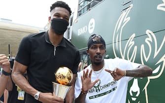 MILWAUKEE, WI - JULY 22: Giannis Antetokounmpo #34 of the Milwaukee Bucks talks with Former NBA Player, Brandon Jennings during their Victory Parade &Rally of the 2021 NBA Finals  on July 22, 2021 at the Fiserv Forum Center in Milwaukee, Wisconsin. NOTE TO USER: User expressly acknowledges and agrees that, by downloading and or using this Photograph, user is consenting to the terms and conditions of the Getty Images License Agreement. Mandatory Copyright Notice: Copyright 2021 NBAE (Photo by David Dow/NBAE via Getty Images). 