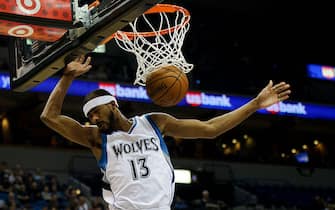 MINNEAPOLIS, MN - NOVEMBER 21: Corey Brewer #13 of the Minnesota Timberwolves dunks the ball against the San Antonio Spurs during the game on November 21, 2014 at Target Center in Minneapolis, Minnesota. The Spurs defeated the Timberwolves 121-92. NOTE TO USER: User expressly acknowledges and agrees that, by downloading and or using this Photograph, user is consenting to the terms and conditions of the Getty Images License Agreement. (Photo by Hannah Foslien/Getty Images)