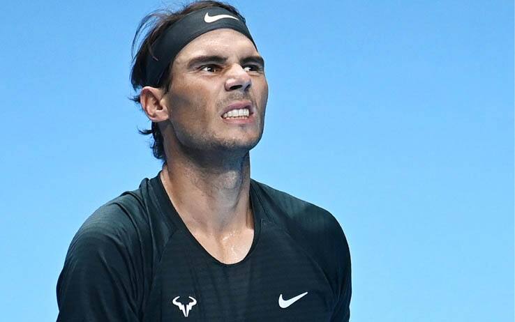 epa08825505 Rafael Nadal of Spain reacts during his group stage match against Dominic Thiem of Austria at the ATP Finals in London, Britain, 17 November 2020.  EPA/ANDY RAIN