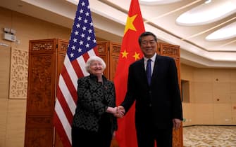 epa11259940 US Treasury Secretary Janet Yellen (L) shakes hands with Chinese Vice Premier He Lifeng (R) during a meeting at the Guangdong Zhudao Guest House in Guangdong province, China, 05 April 2024. Yellen has arrived in a China for five days of meetings in a country that's determined to avoid open conflict with the United States.  EPA/Andy Wong / POOL