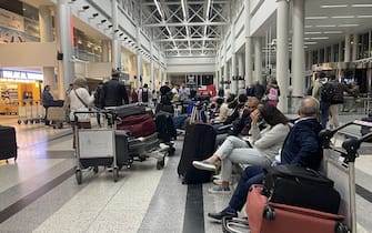 BEIRUT, LEBANON - APRIL 14: Passengers wait at Beirut Rafic Hariri International Airport as Lebanon closed its airspace to all flight after the Iran's attack on Israel, in Beirut, Lebanon on April 14, 2024. (Photo by Houssam Shbaro/Anadolu via Getty Images)