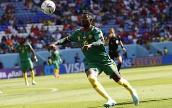 epa10324355 Martin Hongla of Cameroon in action during the FIFA World Cup 2022 group G soccer match between Switzerland and Cameroon at Al Janoub Stadium in Al Wakrah, Qatar, 24 November 2022.  EPA/Rolex dela Pena