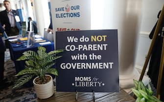 TAMPA, FL - JULY 15: A sign reading "We Do Not CO-PARENT with the Government" is seen in the hallway during the inaugural Moms For Liberty Summit at the Tampa Marriott Water Street on July 15, 2022 in Tampa, Florida. (Photo by Octavio Jones/Getty Images)