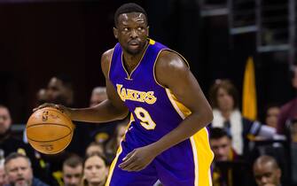 CLEVELAND, OH - DECEMBER 17: Luol Deng #9 of the Los Angeles Lakers drives during the first half against the Cleveland Cavaliers at Quicken Loans Arena on December 17, 2016 in Cleveland, Ohio. NOTE TO USER: User expressly acknowledges and agrees that, by downloading and/or using this photograph, user is consenting to the terms and conditions of the Getty Images License Agreement. Mandatory copyright notice. (Photo by Jason Miller/Getty Images)