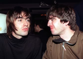 Oasis stars Liam and Noel Gallagher pictured at the Q Magazine music awards in London today (Fri). Oasis frontman Liam received the Best Act in the World trophy on behalf of the band at the 10th anniversary of the awards. See PA story SHOWBIZ Awards. Photo by Fiona Hanson/PA.  30/04/03 : Oasis stars Liam (left) and Noel Gallagher. The band's 1995 hit was named the greatest song of the past decade according to listeners of Virgin Radio.  Music fans were asked to choose their favourite songs of the last 10 years to celebrate the tenth anniversary of Virgin Radio.   (Photo by Fiona Hanson - PA Images/PA Images via Getty Images)