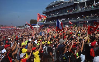 Fans cheer during the podium ceremony after the San Marino MotoGP Grand Prix at the Misano World Circuit Marco-Simoncelli in Misano Adriatico on September 10, 2023. (Photo by Filippo MONTEFORTE / AFP) (Photo by FILIPPO MONTEFORTE/AFP via Getty Images)