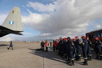 epa10451252 The Greek rescue mission to help Turkey with two devastating earthquakes departs from Elefsina military airport to the Incirlik airport base, Greece, 06 February 2023. The mission includes 21 firefighters from the emergency unit EMAK, 2 rescue dogs, and a special rescue mission vehicle. Also flying with them are a Fire Brigade officer specializing in supporting collapsed buildings, 5 emergency doctors from the EKAV ambulance emergency system, and the president of Greece's Organization of Antiseismic Planning and Protection, Efthymios Lekkas. According to the US Geological Service, an earthquake with a preliminary magnitude of 7.8 struck southern Turkey close to the Syrian border. The earthquake caused buildings to collapse and sent shockwaves over northwest Syria, Cyprus, and Lebanon. Hundreds of people have died and more than seven thousand have been injured in Turkey, according to AFAD, Turkish Disaster and Emergency Management Presidency.  EPA/GEORGE VITSARAS