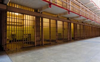 Rows of locked prison cells, Alcatraz, San Francisco, California. Bonus: ghost (see right-middle).