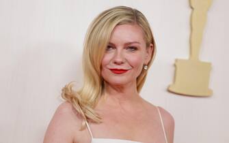 epa11212598 Kirsten Dunst arrives for the 96th annual Academy Awards ceremony at the Dolby Theatre in the Hollywood neighborhood of Los Angeles, California, USA, 10 March 2024. The Oscars are presented for outstanding individual or collective efforts in filmmaking in 23 categories.  EPA/ALLISON DINNER