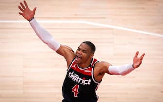 ATLANTA, GA - MAY 10: Russell Westbrook #4 of the Washington Wizards celebrates after scoring to narrow the Hawks’ lead with under a minute left in the fourth quarter of a game between the Washington Wizards and the Atlanta Hawks at State Farm Arena on May 10, 2021 in Atlanta, Georgia. NOTE TO USER: User expressly acknowledges and agrees that, by downloading and or using this photograph, User is consenting to the terms and conditions of the Getty Images License Agreement. (Photo by Casey Sykes/Getty Images) *** Local Caption *** Russell Westbrook