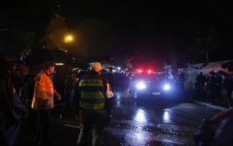 (240810) -- SAO PAULO, Aug. 10, 2024 (Xinhua) -- Police guard near the plane crash site in the neighborhood of Capela de Vinhedo, Sao Paulo state, Brazil, Aug. 9, 2024. A passenger plane crashed in the interior of the Brazilian state of Sao Paulo on Friday, killing all 61 aboard, the airline company Voepass confirmed. The black box of the plane had been recovered. (Paulo Pinto/Agencia Brasil via Xinhua) - Paulo Pinto/Agencia Brasil -//CHINENOUVELLE_XxjpbeE007186_20240810_PEPFN0A001/Credit:CHINE NOUVELLE/SIPA/2408101334