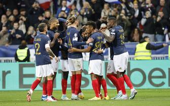 epa10983393 Kylian Mbappe (C) of France is celebrated by teammates after scoring the 4-0 goal during the UEFA EURO 2024 Group B qualification match between France and Gibraltar in Nice, France, 18 November 2023.  EPA/SEBASTIEN NOGIER