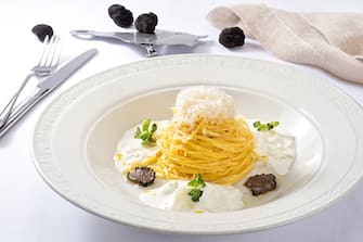 Pasta with burrata cheese, truffle mushroom and truffle oil