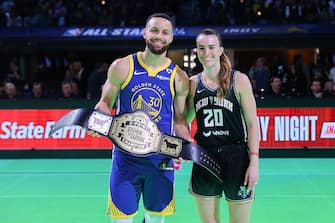INDIANAPOLIS, INDIANA - FEBRUARY 17: Stephen Curry #30 of the Golden State Warriors and Sabrina Ionescu #20 of the New York Liberty pose for a photo after their 3-point challenge during the State Farm All-Star Saturday Night at Lucas Oil Stadium on February 17, 2024 in Indianapolis, Indiana. NOTE TO USER: User expressly acknowledges and agrees that, by downloading and or using this photograph, User is consenting to the terms and conditions of the Getty Images License Agreement. (Photo by Stacy Revere/Getty Images)