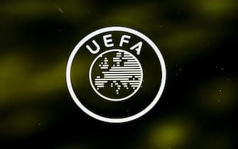 epa08487681 (FILE) - A UEFA logo is pictured through a window prior to the UEFA Europa League 2019/20 Round of 16 draw at the UEFA Headquarters in Nyon, Switzerland, 28 February 2020 (re-issued on 16 June 2020). Lisbon's Estadio da Luz is expected to host the 2020 UEFA Champions League final in a decision by the UEFA executive committee set to be announced on 17 June 2020.  EPA/JEAN-CHRISTOPHE BOTT *** Local Caption *** 55993945