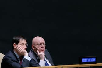 epa10486657 Russia's Ambassador to the United Nations Vassily Nebenzia (R) and Russia's Deputy Ambassador to the United Nations Dmitry Polyanskiy (L) watch as United Nations General Assemble passes a resolution calling for peace in Ukraine during the 11th Emergency Session of the United Nations at United Nations headquarters in New York, New York, USA, 23 February 2023.  EPA/JUSTIN LANE