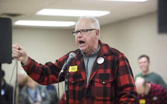 tim walz epa07144100 Democrat Tim Walz campaigns for Minnesota governor in Minneapolis, Minnesota, USA, 05 November 2018. Walz is running against Republican Jeff Johnson in the 06 November general election. EPA/CRAIG LASSIG