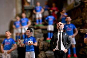 The terracotta statuettes of the Napoli players make up the 'blue nativity scene' created for the upcoming ''Scudetto party'' by the craftsman of San Gregorio Armeno Genny Di Virgilio, in Naples, Italy, 28 April 2023. SSC Napoli lead the Serie A, continuing their seemingly unstoppable march towards the title. ANSA / CIRO FUSCO