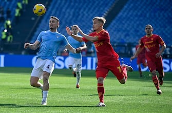 Lazio's Patric (L) in action against Lecce's Pontus Almqvist (R) during the Serie A soccer match between SS Lazio and US Lecce at the Olimpico stadium in Rome, Italy, 14 January 2024. ANSA/RICCARDO ANTIMIANI